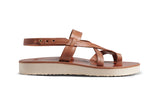 Side view of Wigeon back strap sandal in cognac