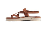 Side view of Wigeon back strap sandal in cognac