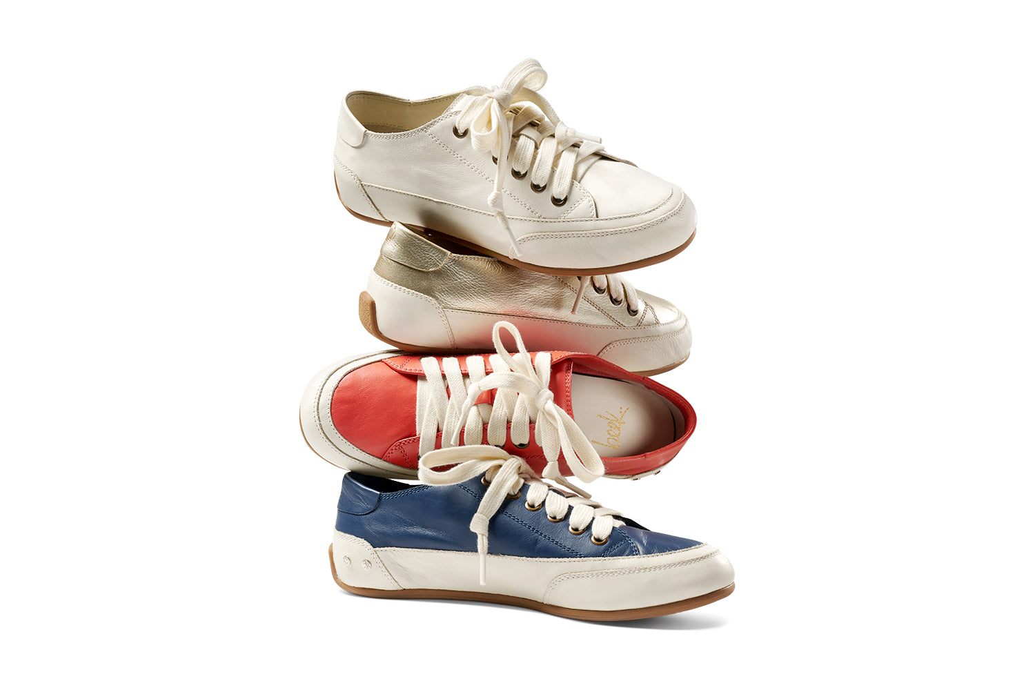 Stack of Sandpiper leather sneakers in white, platinum, tomato, navy