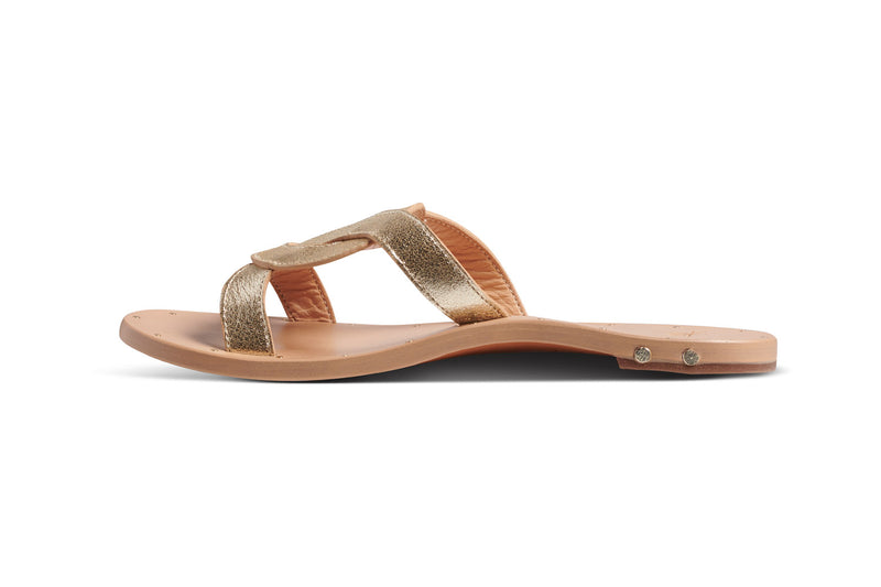 Batis leather slide sandals in platinum/beach - side shot