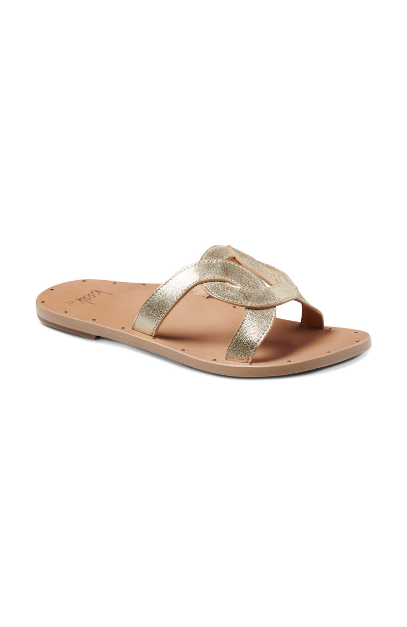 Batis leather slide sandals in platinum/beach - single shoe angle shot