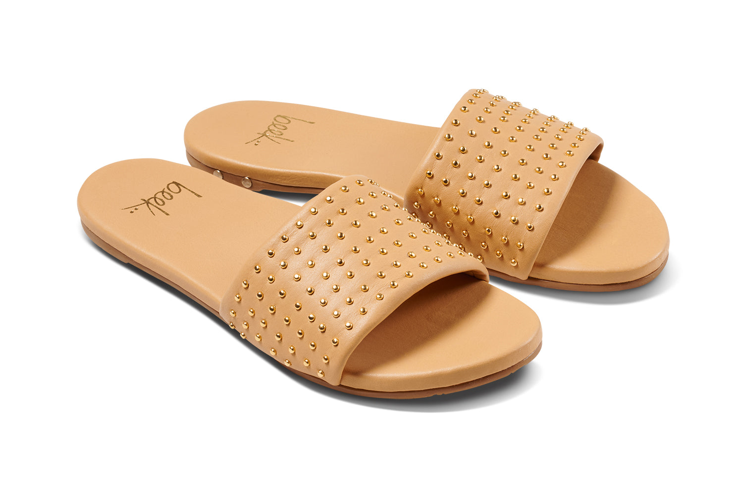 Blingbird leather studded slide sandals in beach - product angle shot