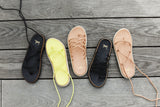 Chirp leather ankle wrap sandals in black, citrus, and beach.