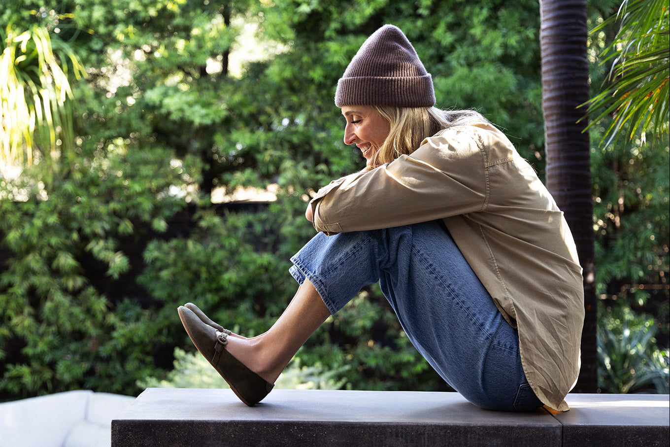Abbie Crane wearing Crane velvet mary jane shoes in sage with jeans