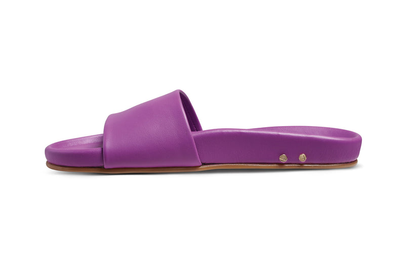Gallito leather slide sandal in iris - side shot