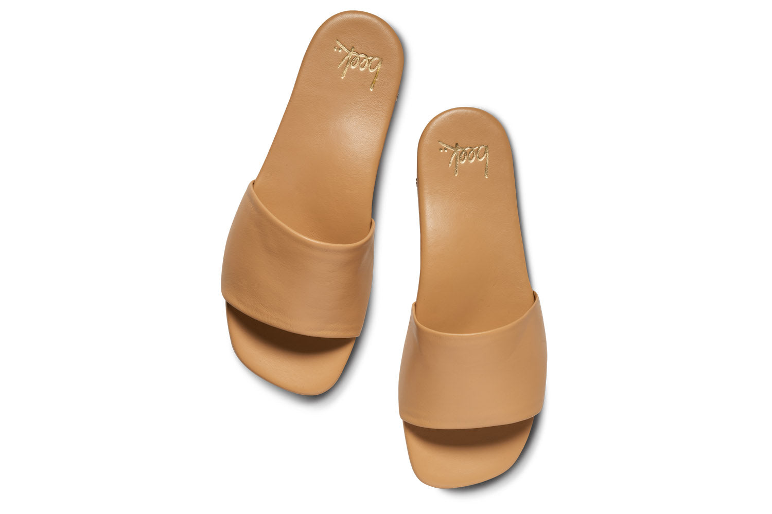 Honeybird leather slide sandals in beach - top shot