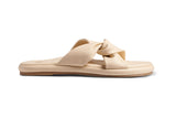 Piculet twisted leather slide sandals in macadamia - side shot