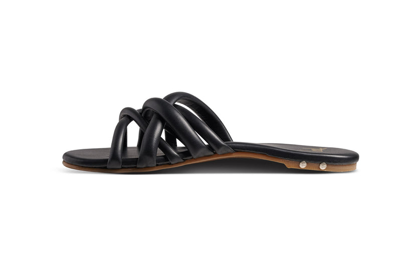 Puffback leather slide sandal in black - side shot
