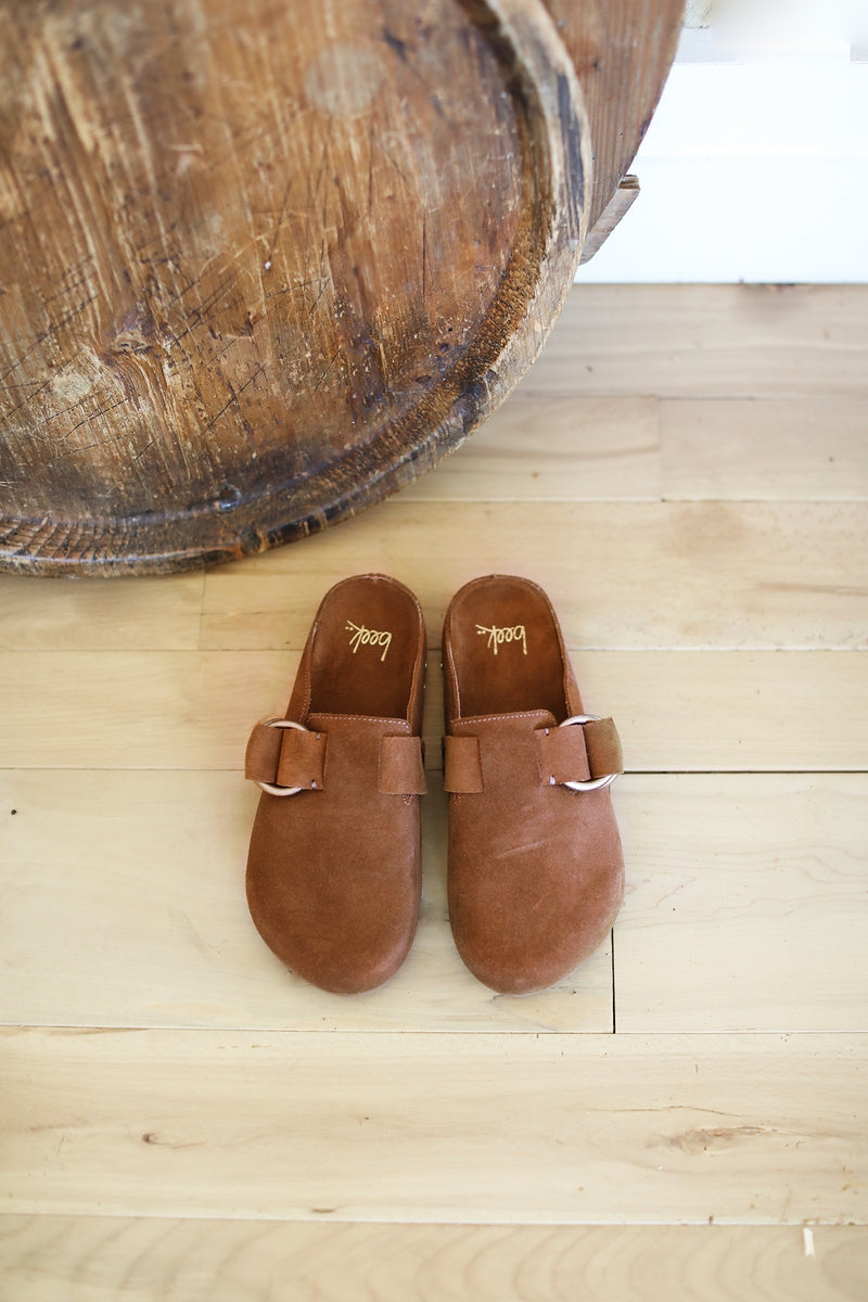 Vulture suede mules in chestnut - lifestyle shot