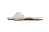 Whipbird leather slide sandal in eggshell - side shot