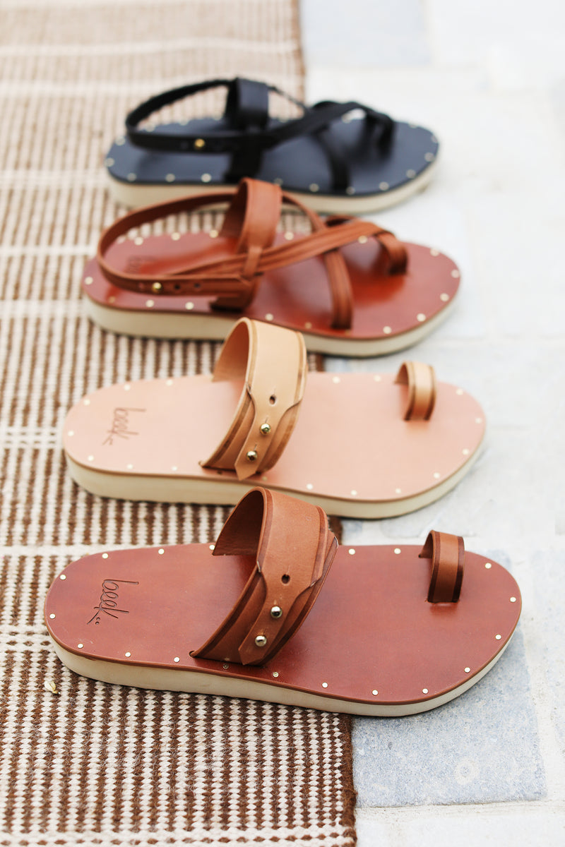 Whistler burnished leather toe-ring sandal in honey and cognac with Wigeon burnished leather sandals in cognac and black