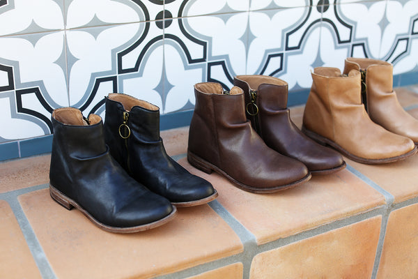 Group product shot of Quail leather ankle boots in black, chocolate, saddle