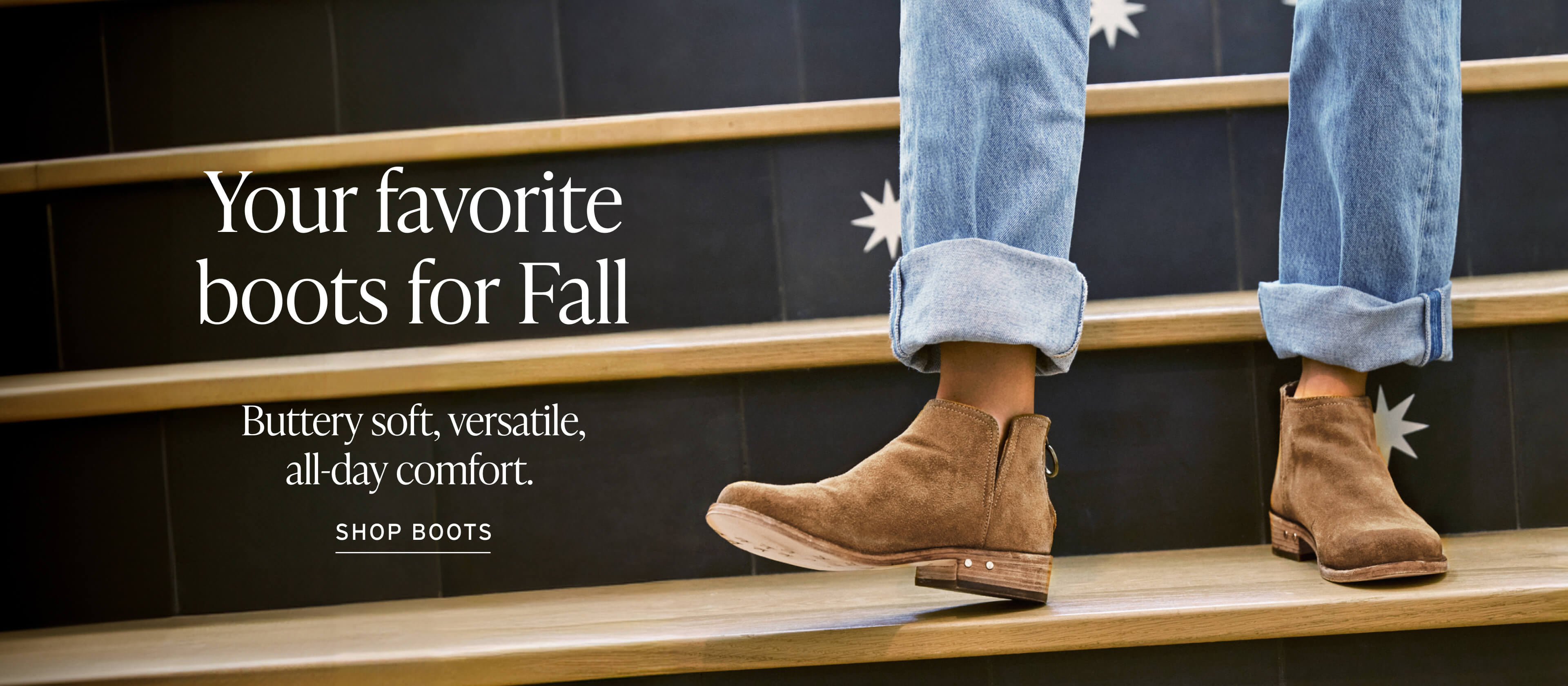 Woman wearing Falcon suede booties in chestnut with jeans standing on steps. Caption "Your favorite boots for Fall; Buttery soft, versatile, all-day comfort." with link to SHOP BOOTS