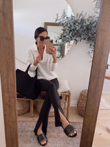 Sharon from @itsybitsyindulgences wearing Gallito Shearling leather slide sandals in black.