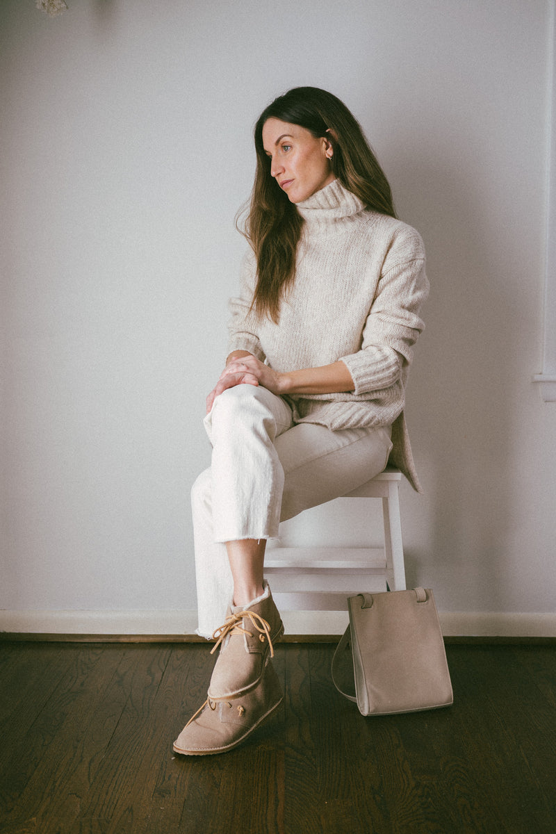 @ashrohr wearing Penguin shearling booties in stone.