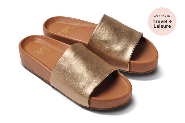 Pelican leather platform sandal in gold/honey - angle shot - as seen in Travel + Leisure