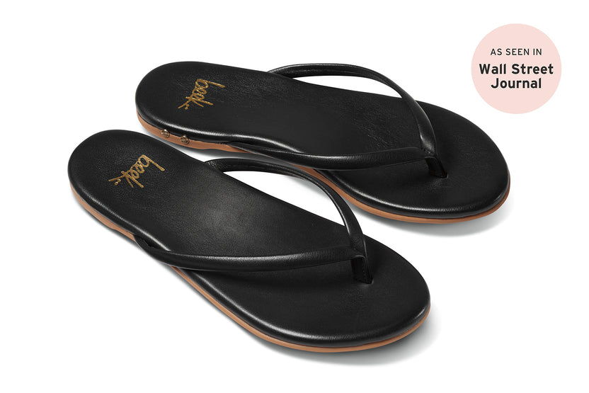 Sunbeam leather flip flop sandal in black - angle shot - with "as seen in Wall Street journal" press bubble
