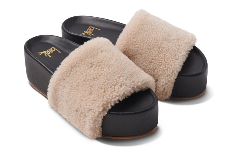 Albatross Shearling platform sandal in natural/black - product angle shot