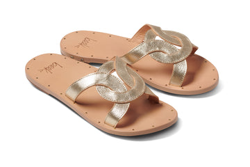Batis leather slide sandals in platinum/beach - angle shot