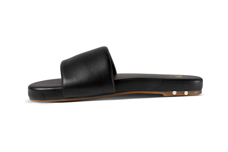 Baza leather slide sandals in black - side shot