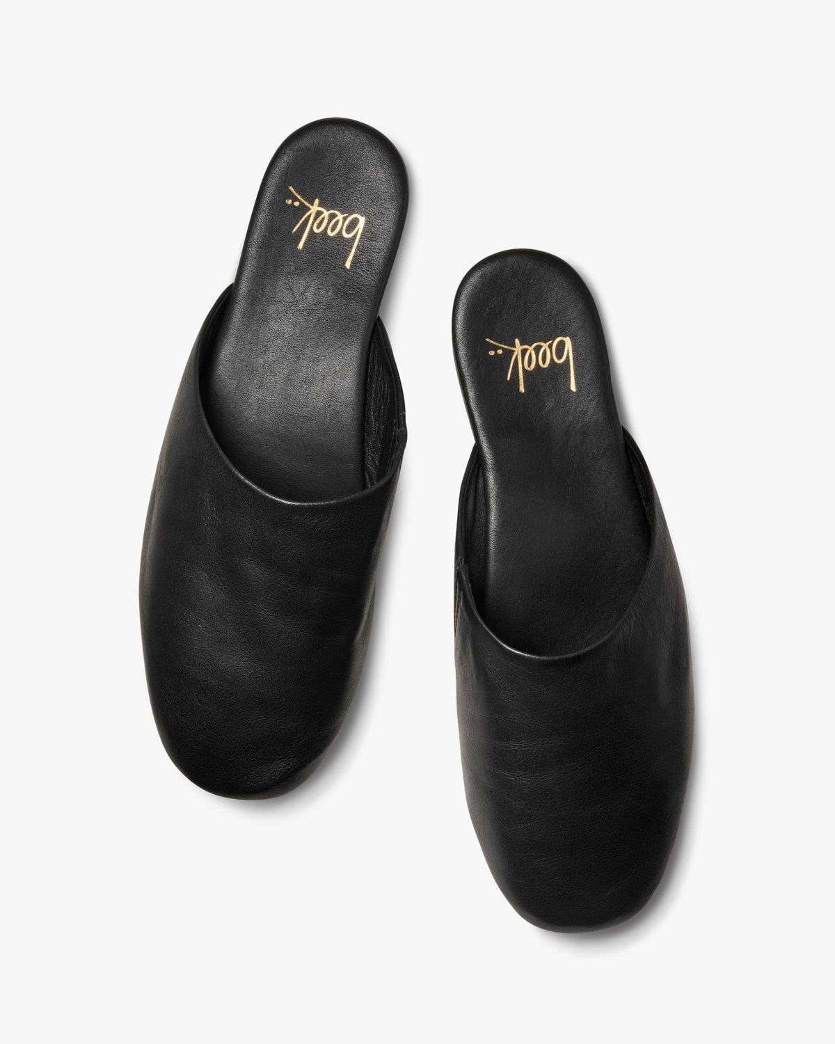 Blackbird leather mules in black - product top shot