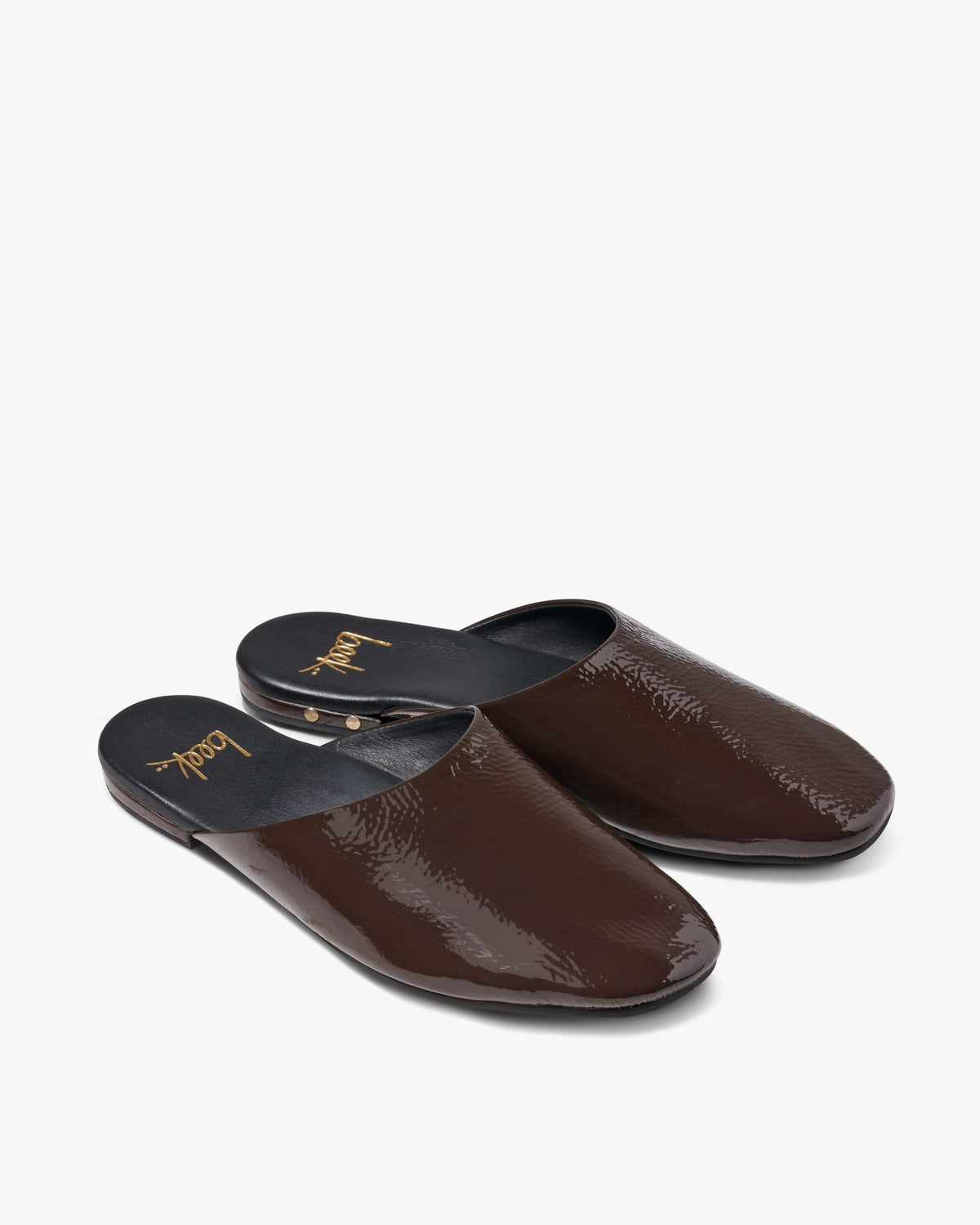 Blackbird patent leather mules in coffee - product angle shot