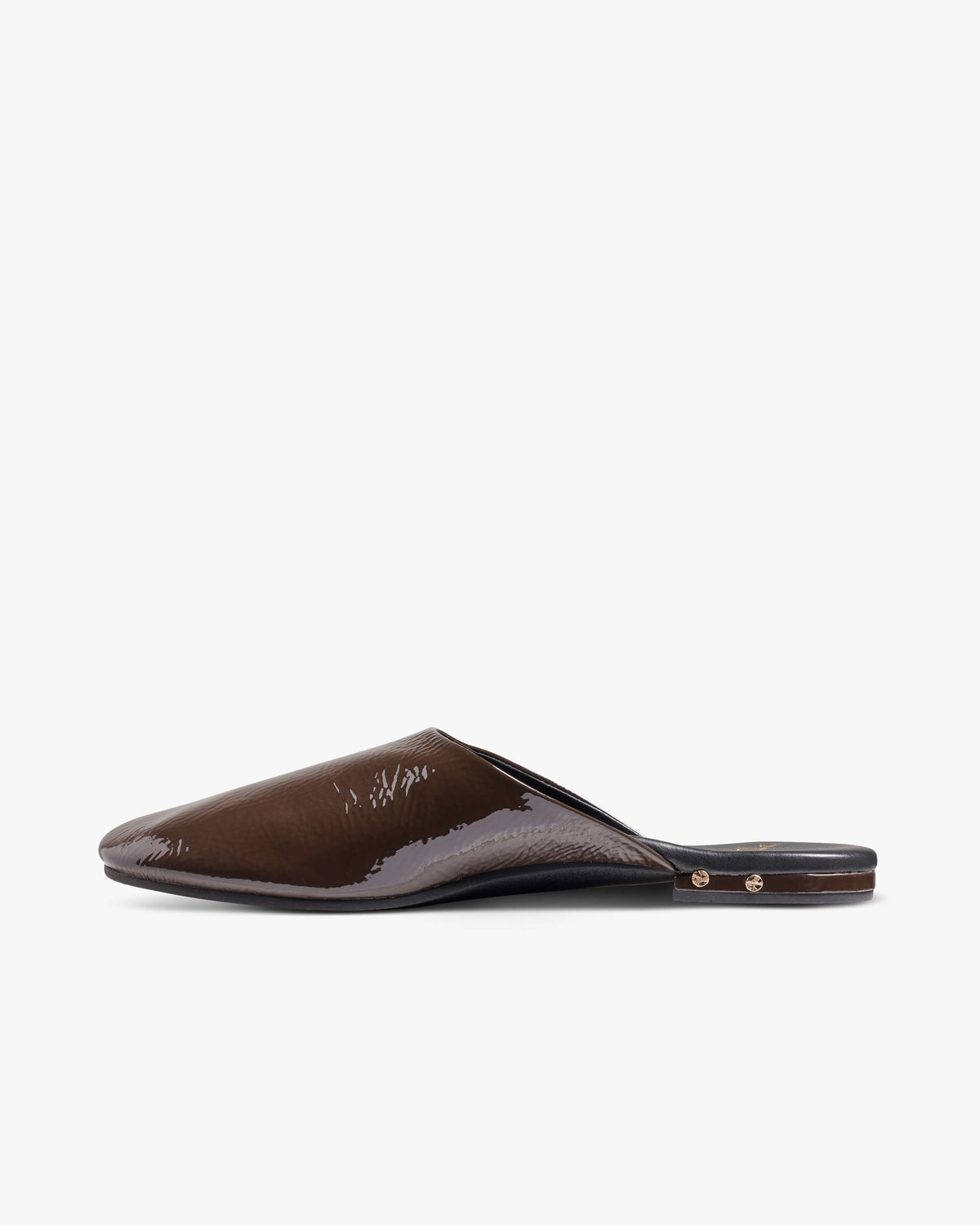 Blackbird patent leather mules in coffee - product side shot