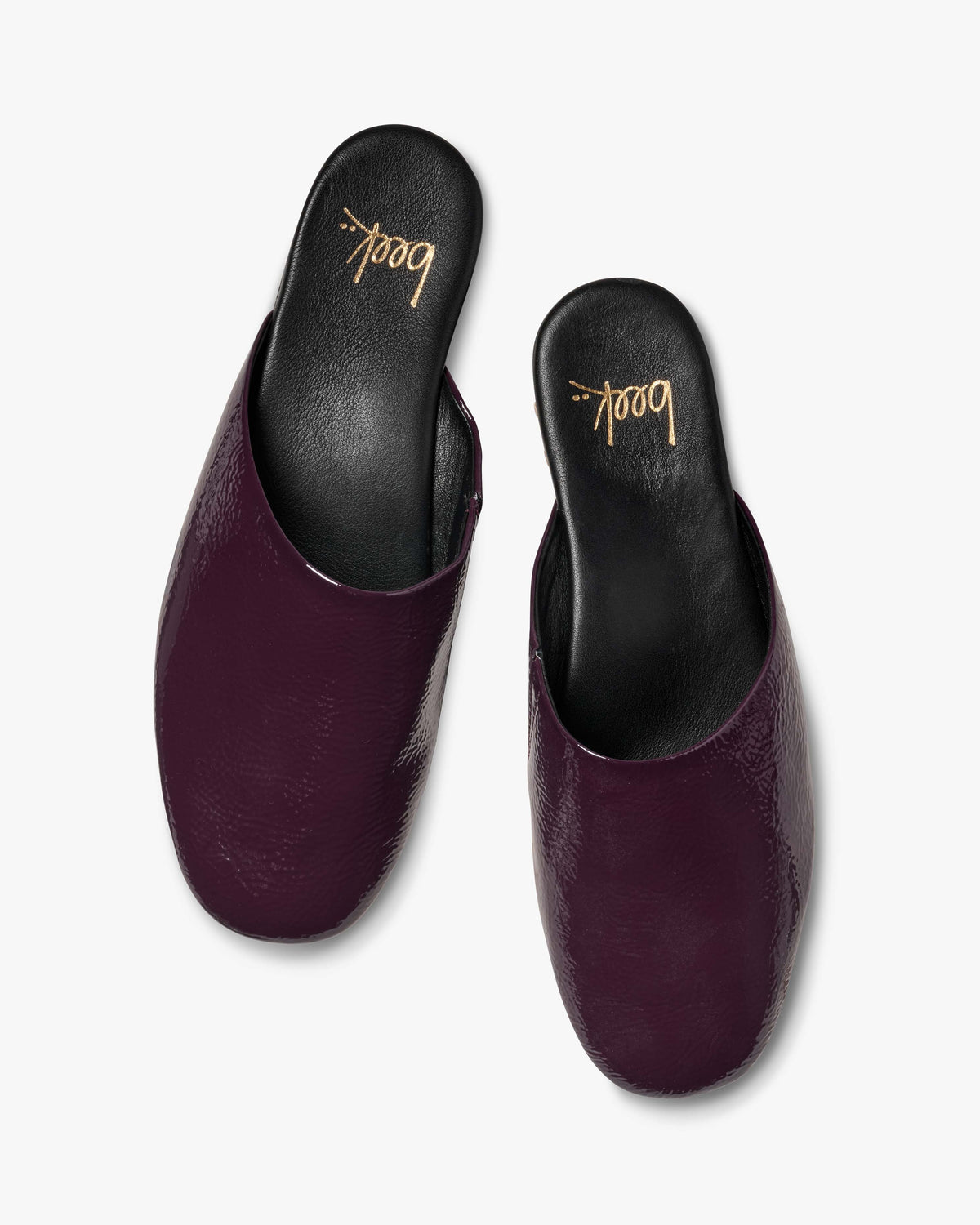 Blackbird patent leather mules in prune - product top shot