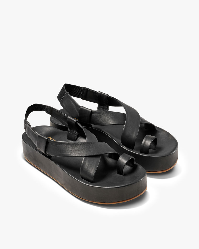 Caracara leather platform sandal in black - product angle shot