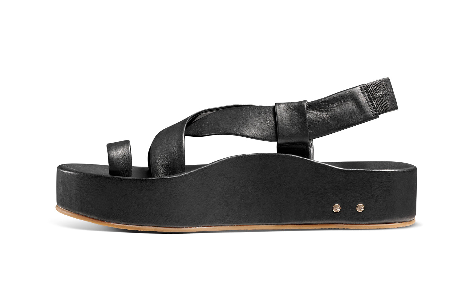 Caracara leather platform sandal in black - product side shot
