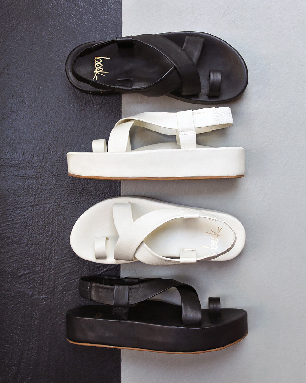 Group shot of Caracara leather platform sandal in black and vanilla