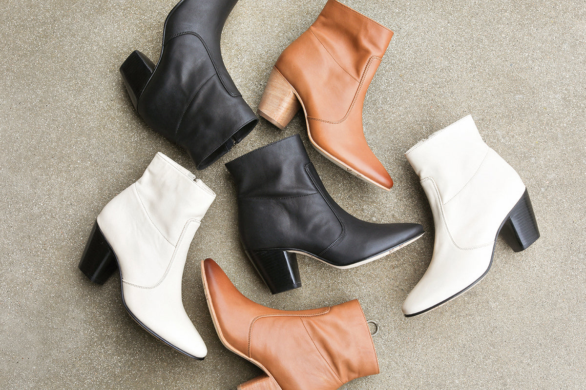 Group shot of Catbird leather boots in black, tan, and eggshell.