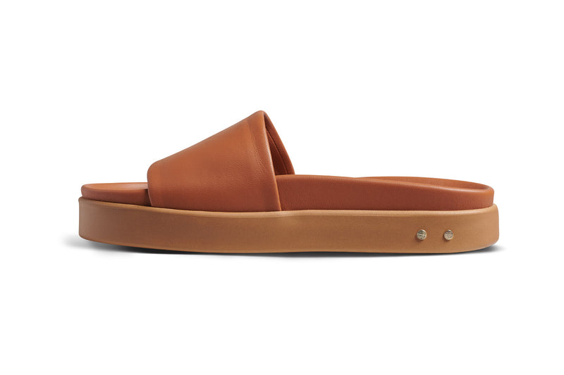 Chick leather platform slide sandals in tan - side shot