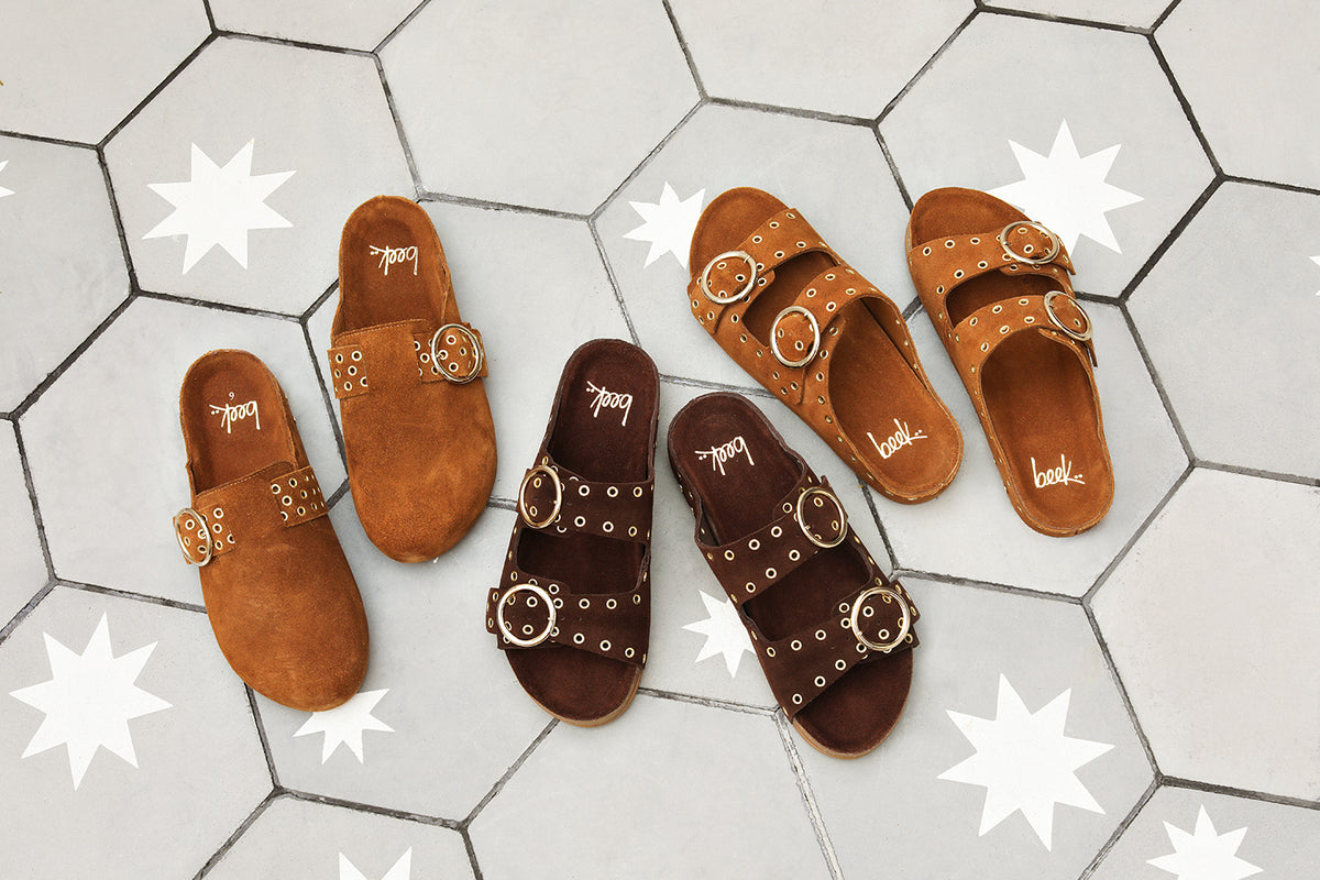 Group shot of Comet suede mule in chestnut with Cedar suede sandals in coffee and chestnut.