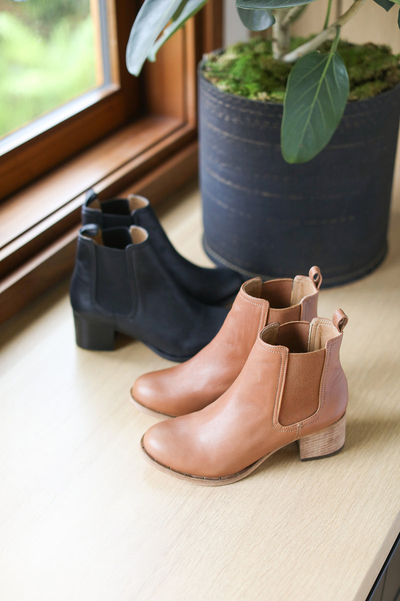 Condor leather boots in cognac and black.