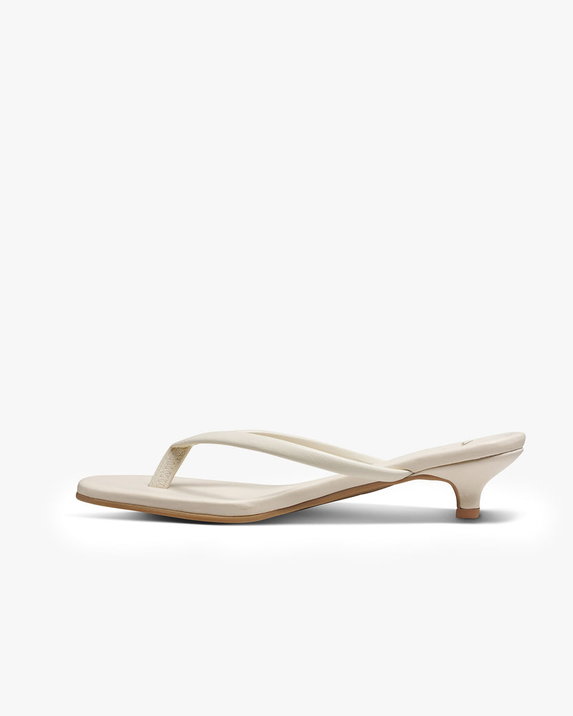 Corella leather kitten heel sandal in vanilla - product side shot