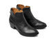 Cowbird leather boot in black - product angle shot