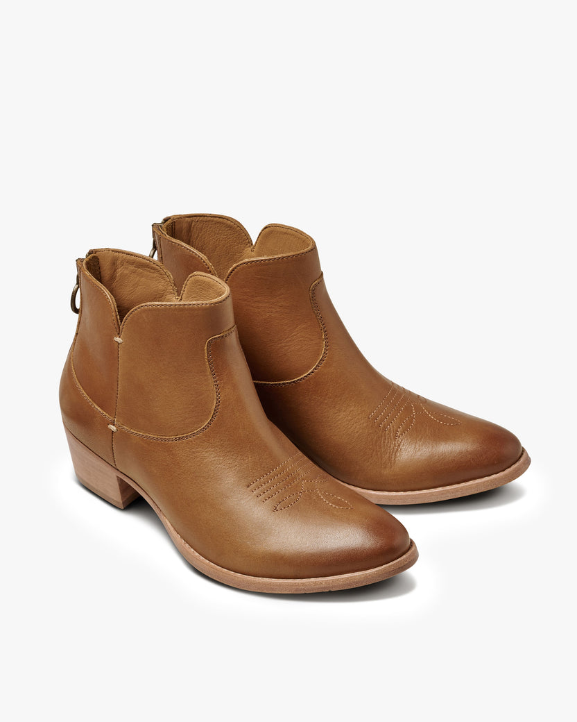 Cowbird leather ankle boots in tan - product angle shot