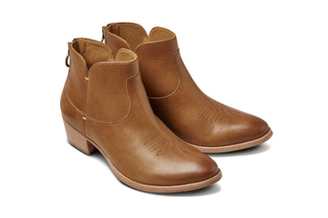 Cowbird leather ankle boots in tan - product angle shot