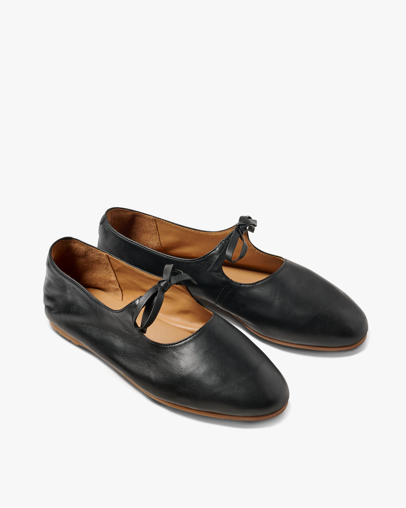 Crane bow leather mary jane shoes in black - product angle shot