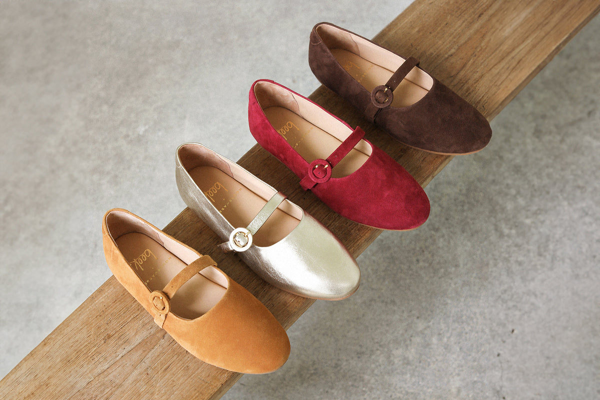 Group shot of Crane mary jane shoes in caramel suede, gold leather, port suede, coffee suede.