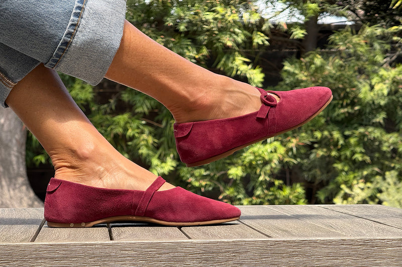 Woman wearing Crane suede mary jane shoe in port with jeans