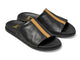 Crest leather slide sandals in black with tan stripe - product angle shot