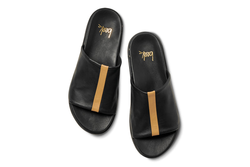 Crest leather slide sandals in black with tan stripe - product top shot
