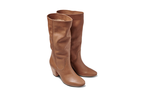 Crow tall leather boots in tan - product angle shot