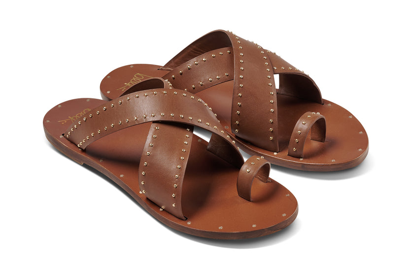 Curlew leather studded toe-ring sandal in tan - product angle shot