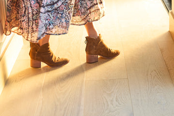 Woman wearing Eagle suede boots in chestnut with floral dress