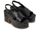 Emu leather platform heel sandal in black - product ankle shot