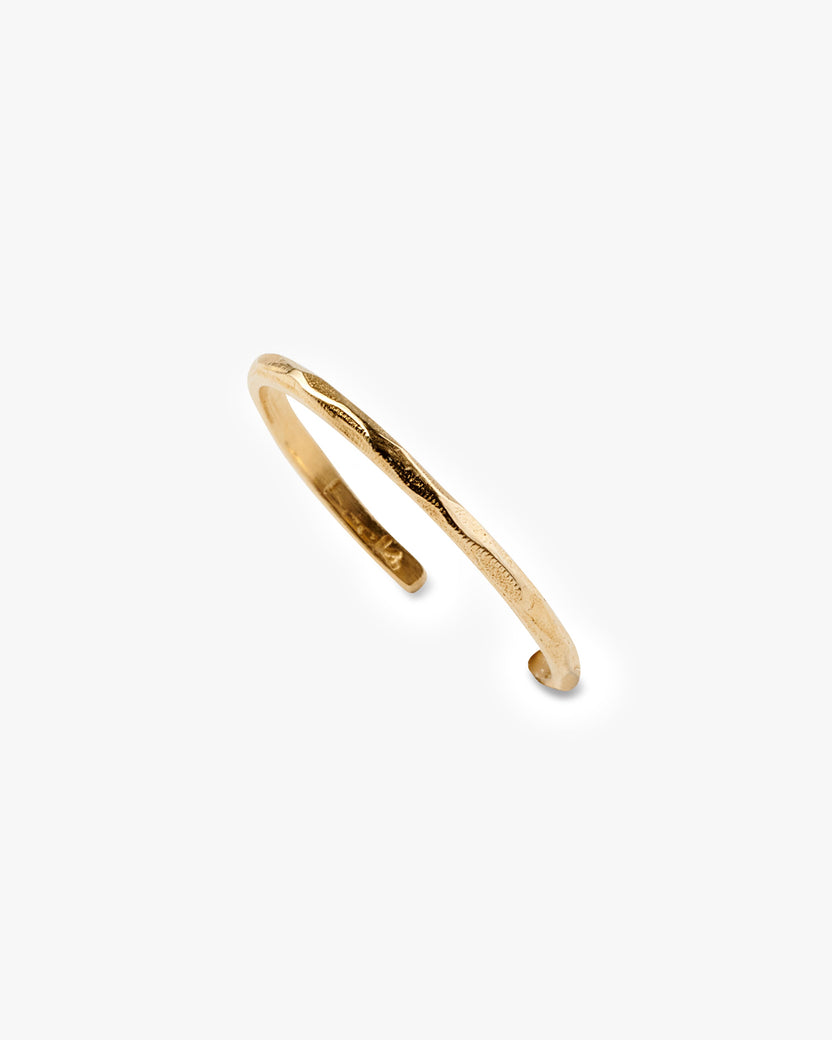 Faceted toe ring in gold