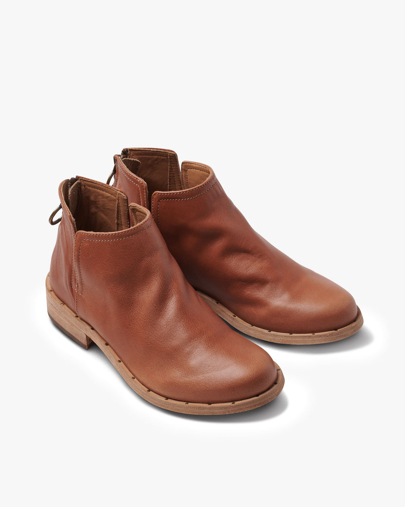 Falcon leather booties in cognac - angle shot